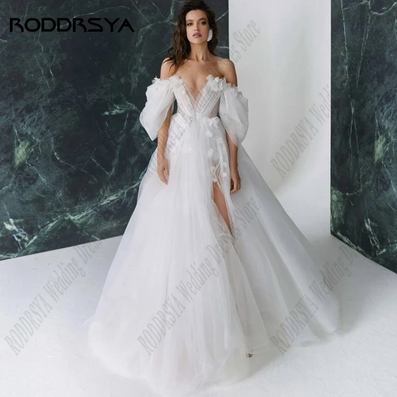 Свадебное платье RODDRSYA с 3D цветами, открытыми плечами, для невесты, принцессы, с высоким разрезом, тюлевые Свадебные платья vestido noiva boho
Свадебное платье RODDRSYA с 3D цветами, открытыми плечами, для невесты, принцессы, с высоким разрезом, тюлевые Свадебные платья vestido noiva boho