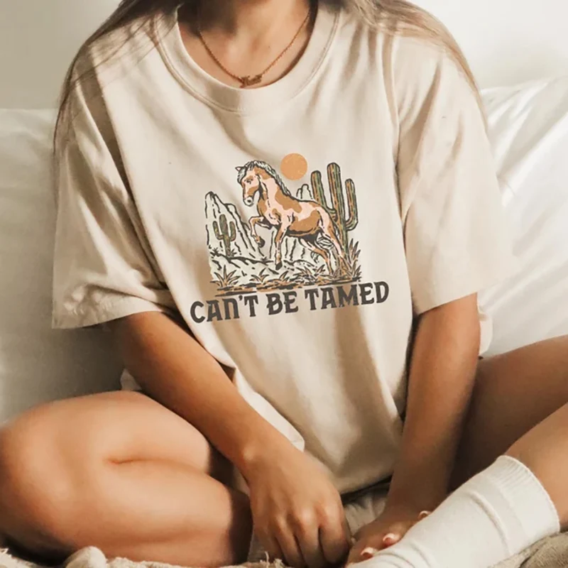 Can't Be Tamed Print Tshirt Summer Fashion Women Clothing Western Cowgirl Graphic Tee Cute Vintage Shirt Rodeo Tops Grunge
Can't Be Tamed Print Tshirt Summer Fashion Women Clothing Western Cowgirl Graphic Tee Cute Vintage Shirt Rodeo Tops Grunge