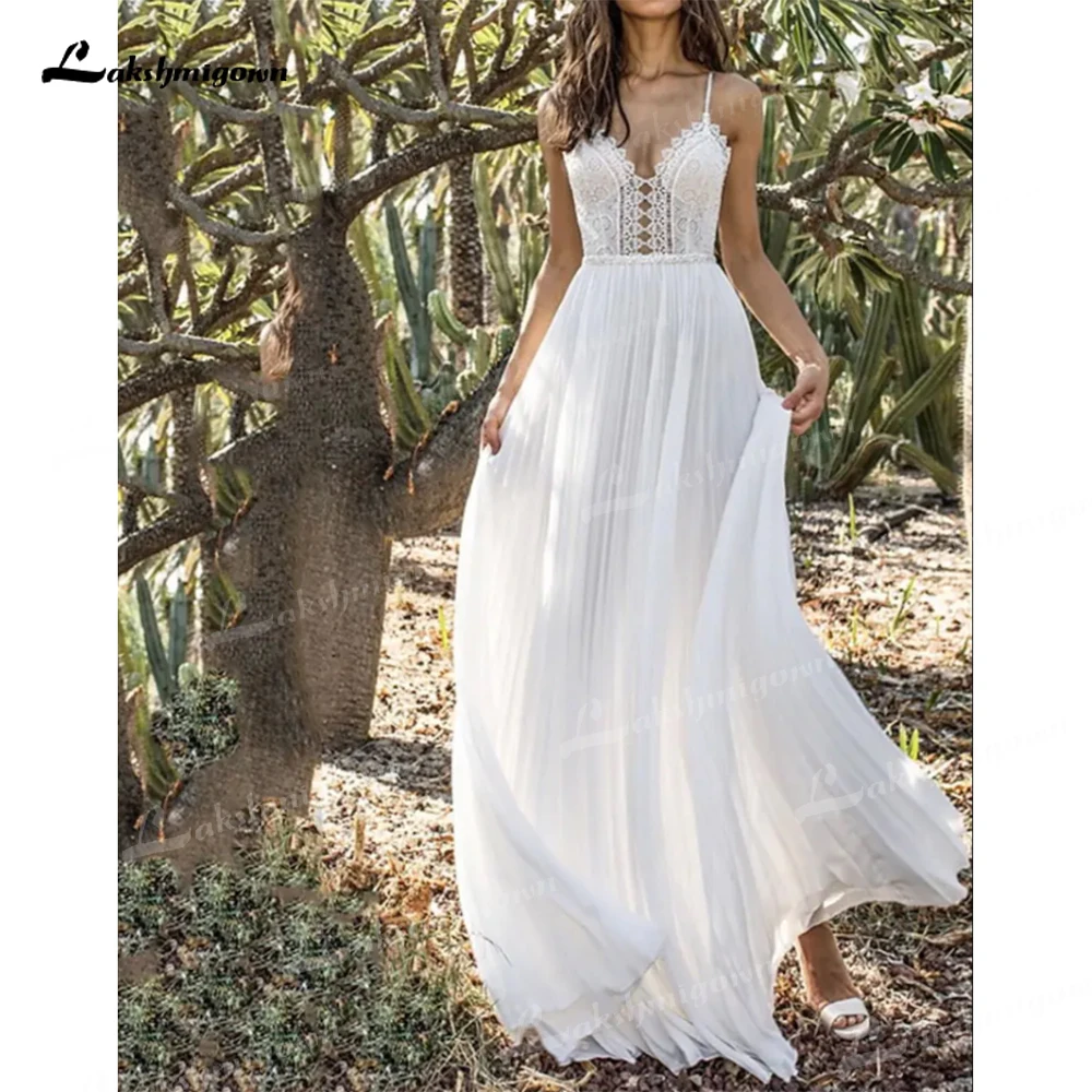 Lakshmigown Beach A Line Wedding Dress Simple Spaghetti Straps V Neck Stunning Lace Tulle Wedding Gown vestido longo Custom made
Lakshmigown Beach A Line Wedding Dress Simple Spaghetti Straps V Neck Stunning Lace Tulle Wedding Gown vestido longo Custom made