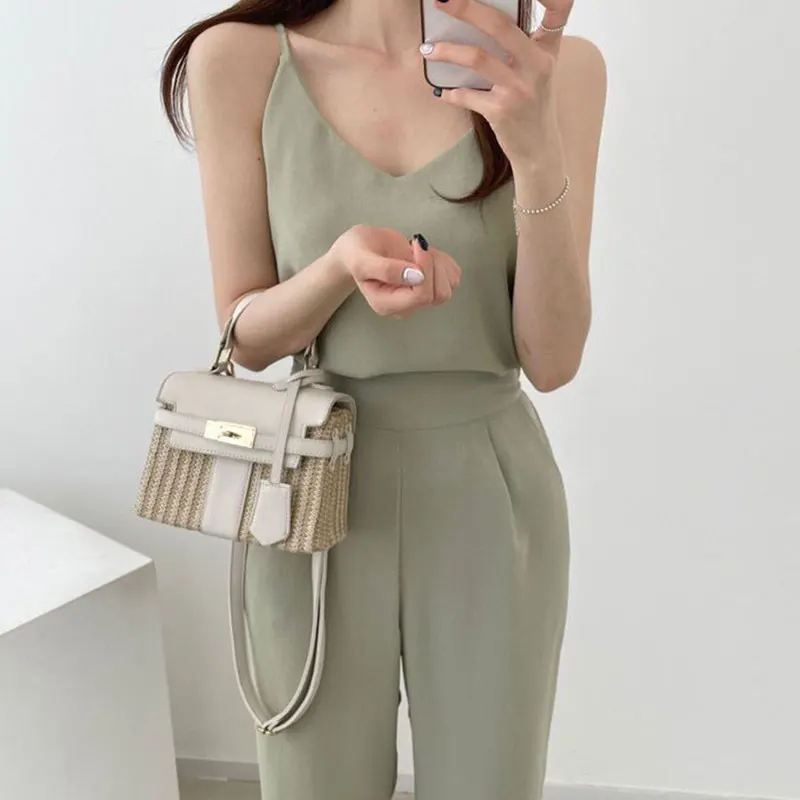 Clothland Women Summer Camis Suit Sleeveless V Neck Strap Blouse High Waist Trousers Female Two Piece Sets Mujer TZ578
Clothland Women Summer Camis Suit Sleeveless V Neck Strap Blouse High Waist Trousers Female Two Piece Sets Mujer TZ578