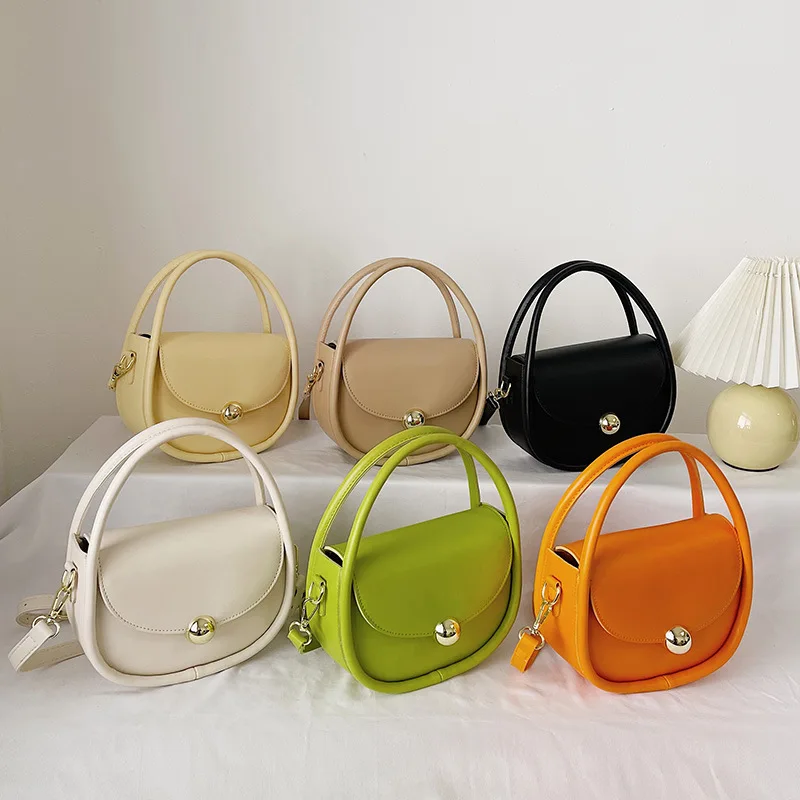 New women's solid color fashion small round purses ladies shoulder messenger handbags
New women's solid color fashion small round purses ladies shoulder messenger handbags