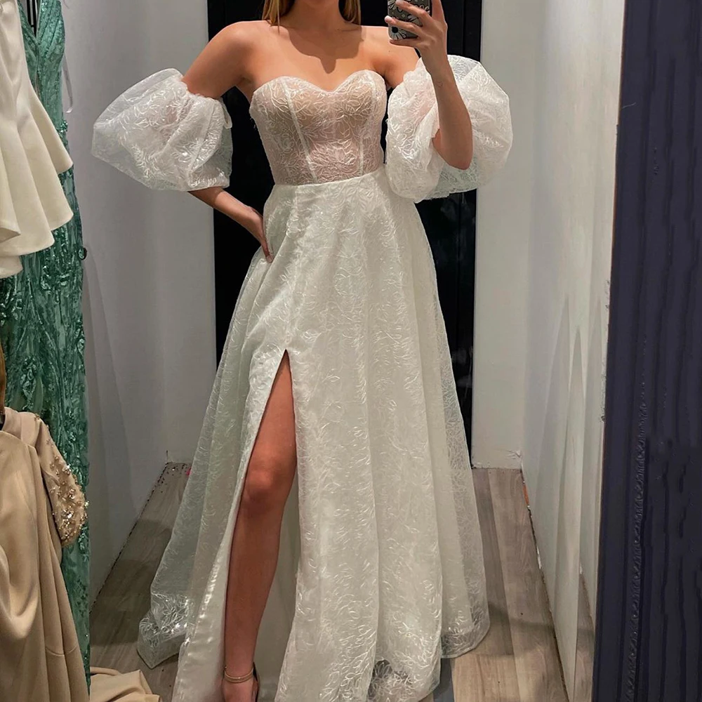 Sparkly Lace Wedding Dresses 2022 with Puffy Sleeve Illusion Cross Back Top Evening Party Gowns A-Line Prom Dress Long with Slit
Sparkly Lace Wedding Dresses 2022 with Puffy Sleeve Illusion Cross Back Top Evening Party Gowns A-Line Prom Dress Long with Slit