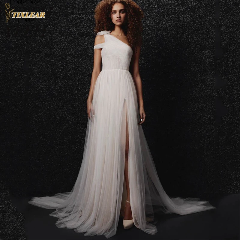 Tixlear Strapless Floor Length Wedding Dresses for Women Girls Tulle Backless One Shoulder Bridal Gowns Junior Married Wear
Tixlear Strapless Floor Length Wedding Dresses for Women Girls Tulle Backless One Shoulder Bridal Gowns Junior Married Wear