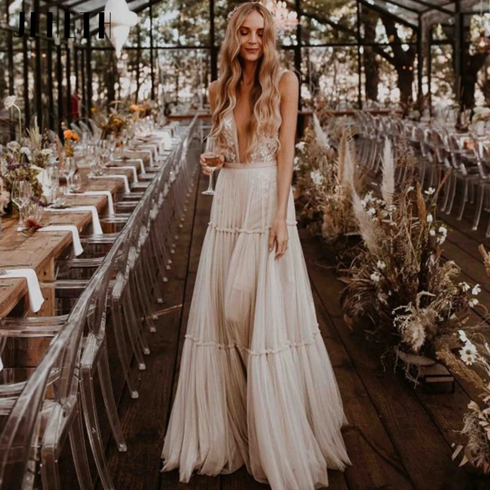 Bohemian Wedding Dresses Sexy Deep V Neck Open Back Sleeveless A-Line Floor Length Backless Lace Bride Gown2023 Robe De Mariée
Bohemian Wedding Dresses Sexy Deep V Neck Open Back Sleeveless A-Line Floor Length Backless Lace Bride Gown2023 Robe De Mariée