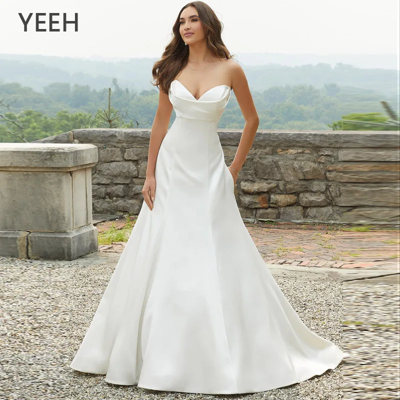 YEEH Princess Strapless Sweetheart Wedding Dress Simple Backless Button Ruffle Bridal Gowns A-Line Sweep Train Vestido De Novia
YEEH Princess Strapless Sweetheart Wedding Dress Simple Backless Button Ruffle Bridal Gowns A-Line Sweep Train Vestido De Novia