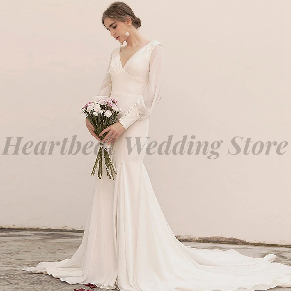 Simple Chiffon Mermaid Wedding Dresses for Women with Long Sleeve V-Neck Backless Court Train Button 2023 Robe De Mariee
Simple Chiffon Mermaid Wedding Dresses for Women with Long Sleeve V-Neck Backless Court Train Button 2023 Robe De Mariee