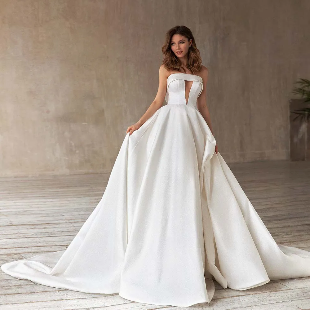 Simple Bridal Gowns Strapless Button Satin Wedding Dress A-Line Sweep Train Cut-Out 2022 New Bride Gown For Women Robe De Marié
Simple Bridal Gowns Strapless Button Satin Wedding Dress A-Line Sweep Train Cut-Out 2022 New Bride Gown For Women Robe De Marié