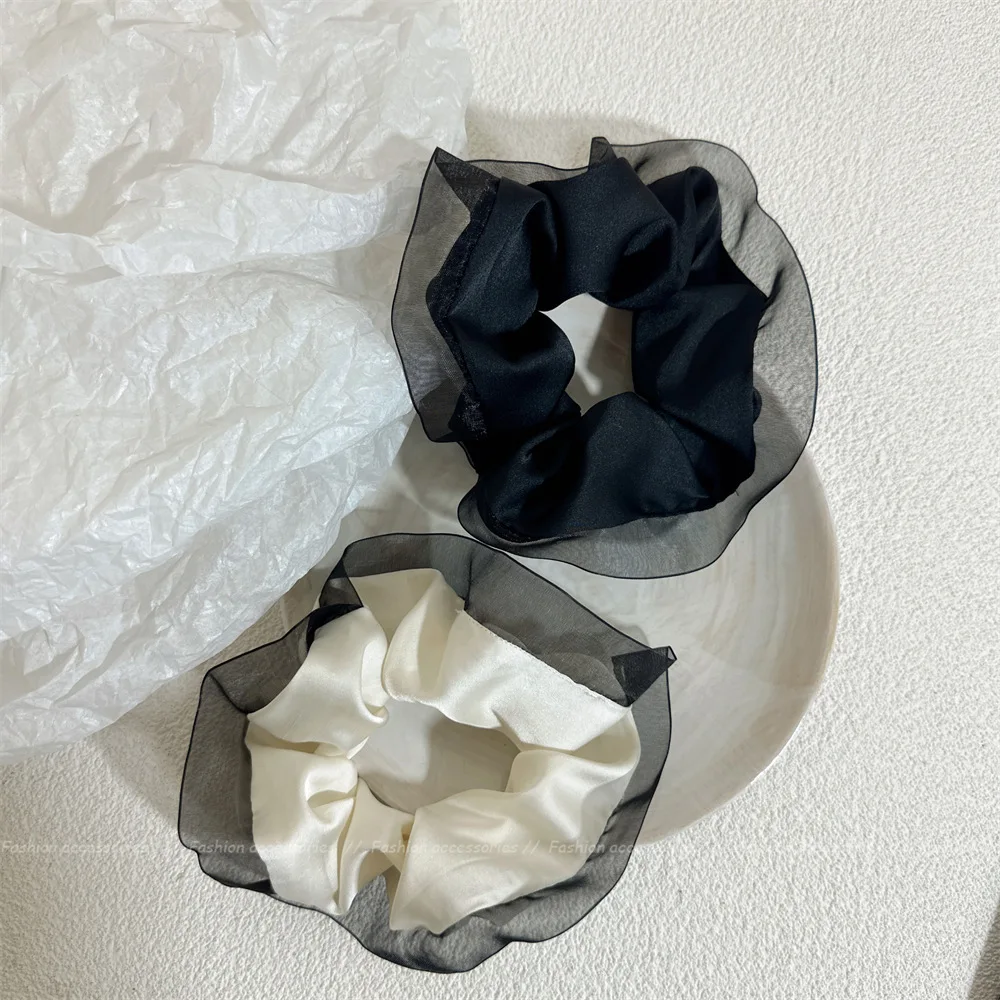 2023 new romantic transparent organza contrast color satin large intestine hair ring temperament high-end sense hair rope female
2023 new romantic transparent organza contrast color satin large intestine hair ring temperament high-end sense hair rope female