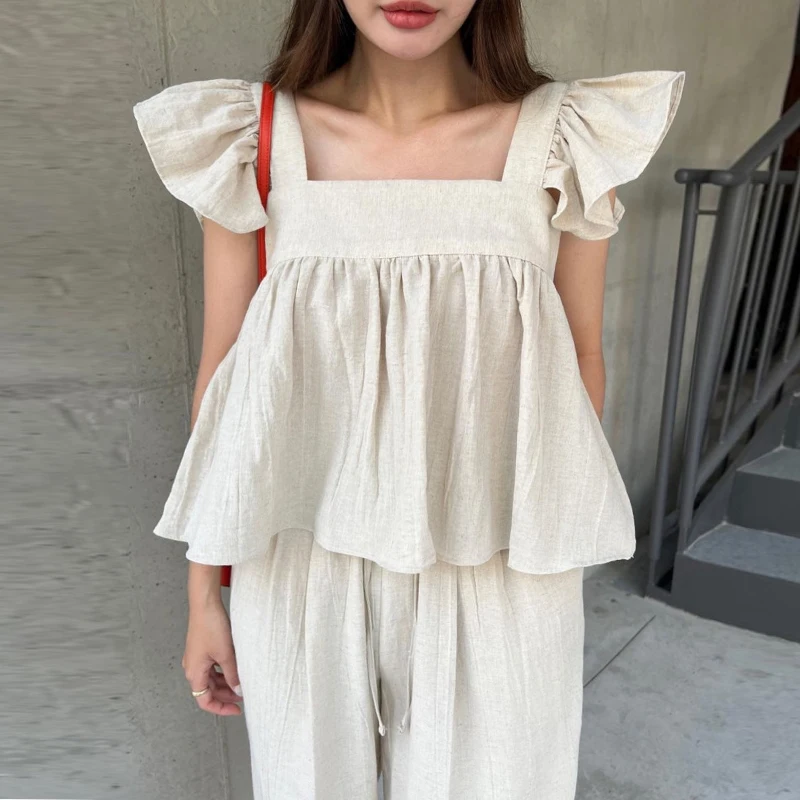 Clothland Women Elegant Linen Trousers Suit Ruffles Sleeveless Top Long Pants Two Piece Set Summer Suits TZ509
Clothland Women Elegant Linen Trousers Suit Ruffles Sleeveless Top Long Pants Two Piece Set Summer Suits TZ509