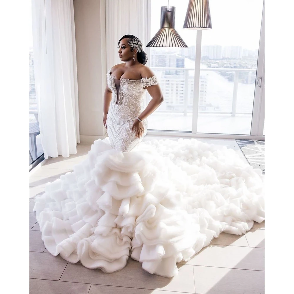 Elegant Mermaid Wedding Dresses Off The Shoulder Appliques Beads Sexy Bridal Gowns with Puffy Ruffles African vestido de novia
Elegant Mermaid Wedding Dresses Off The Shoulder Appliques Beads Sexy Bridal Gowns with Puffy Ruffles African vestido de novia