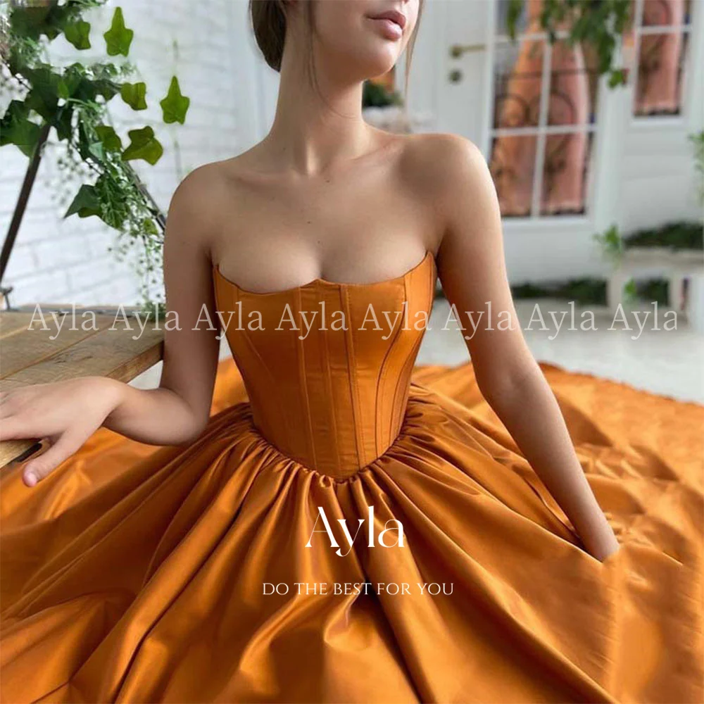 فستان Custom Color Orange Strapsess Satin Prom Dresses A Line Backless Long Formal Evening Gowns vestidos de ocasión formales
فستان Custom Color Orange Strapsess Satin Prom Dresses A Line Backless Long Formal Evening Gowns vestidos de ocasión formales