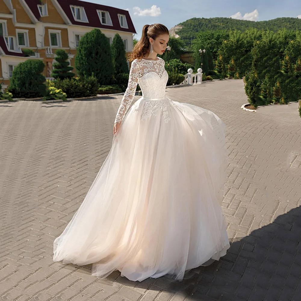 Elegant O-Neck Long Sleeves Appliques Tulle A-Line Wedding Dress For Bride 2022 Lace Up Back Bridal Gown With Long Train
Elegant O-Neck Long Sleeves Appliques Tulle A-Line Wedding Dress For Bride 2022 Lace Up Back Bridal Gown With Long Train