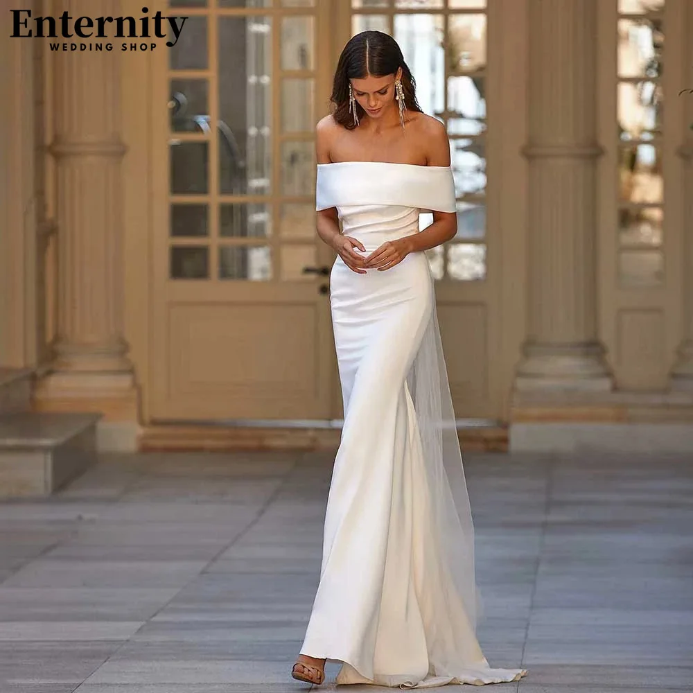 Graceful Off The Shoulder Wedding Dress Boat Neck Mermaid Bridal Gown Beach Sweep Train Simple Crost Back Robe De Mariée
Graceful Off The Shoulder Wedding Dress Boat Neck Mermaid Bridal Gown Beach Sweep Train Simple Crost Back Robe De Mariée