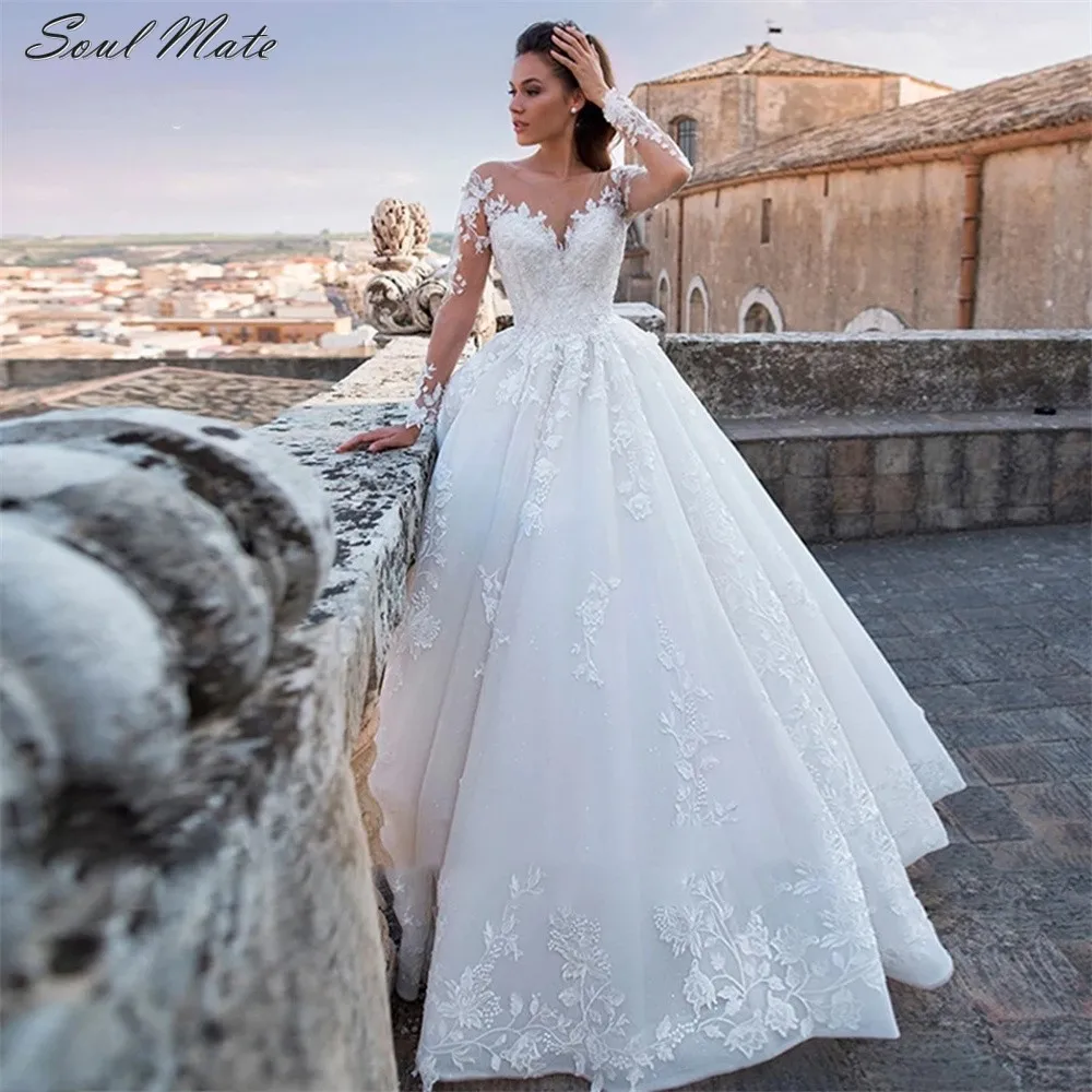 Elegant Wedding Dresses Illusion Long Sleeves Appliques Lace Bride Dress Princess Tulle Backless Bridal Gown Vestidos De Noiva
Elegant Wedding Dresses Illusion Long Sleeves Appliques Lace Bride Dress Princess Tulle Backless Bridal Gown Vestidos De Noiva