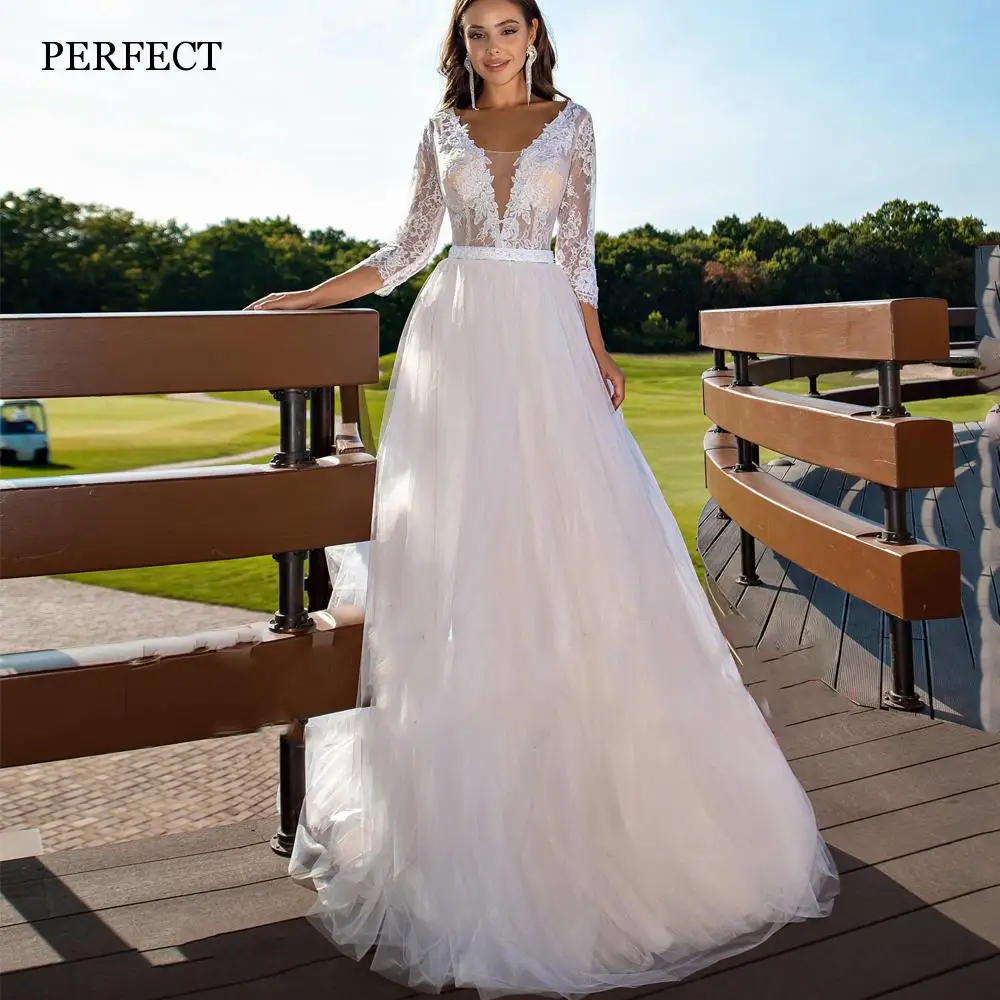 PERFECT Fashion V-Neck Lace Appliques Wedding Dresses 3/4 Sleeves Illusion Back A-Line Bridal Gowns Custom Made Robe De Mariée
PERFECT Fashion V-Neck Lace Appliques Wedding Dresses 3/4 Sleeves Illusion Back A-Line Bridal Gowns Custom Made Robe De Mariée