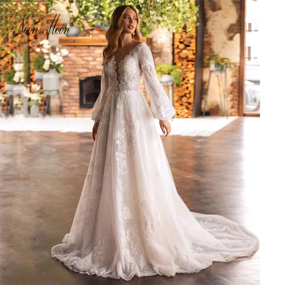 Boho New A-Line Wedding Dresses Charming V-Neck Lace Bridal Gown Pretty Sexy Backless Bride Robe Long Sleeve Vestidos De Novia
Boho New A-Line Wedding Dresses Charming V-Neck Lace Bridal Gown Pretty Sexy Backless Bride Robe Long Sleeve Vestidos De Novia