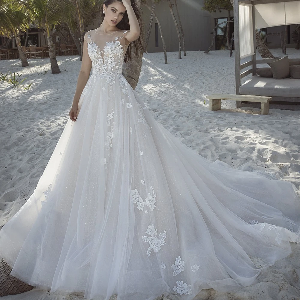 Exquisite Cap Sleeve A-Line Wedding Dress Classic Applique Tulle Floor Length Illusion with Buttons Sweep Train Bride Gowns
Exquisite Cap Sleeve A-Line Wedding Dress Classic Applique Tulle Floor Length Illusion with Buttons Sweep Train Bride Gowns