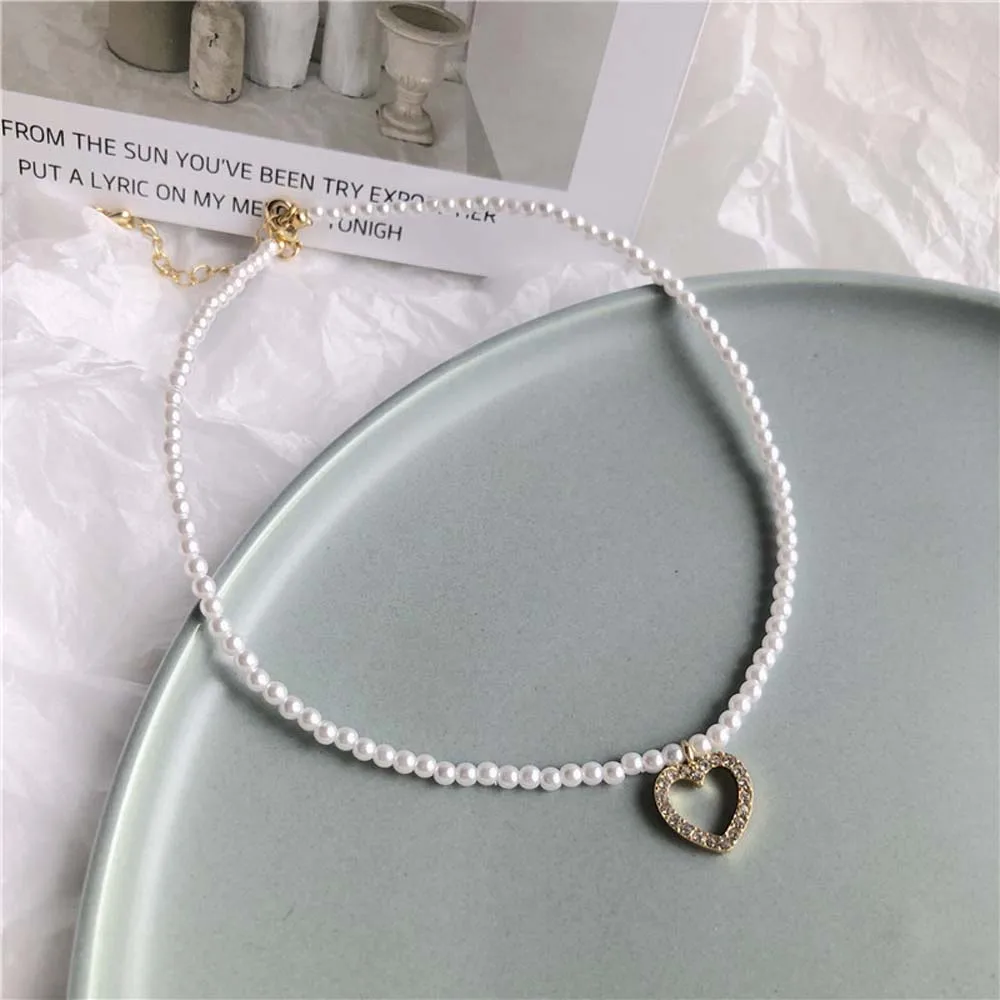 Korean Design Pearls Choker Necklace Female Love Pendant Necklaces Women Fashion Gold Color Jewelry
Korean Design Pearls Choker Necklace Female Love Pendant Necklaces Women Fashion Gold Color Jewelry