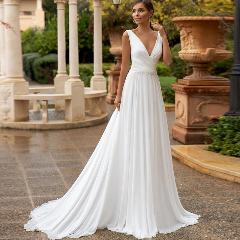 Elegant V-neck Beach Wedding Dress Backless A-Line Beaded Chiffon Bride Dress Sweep Train Wedding Gown Customized Robe de mariée
Elegant V-neck Beach Wedding Dress Backless A-Line Beaded Chiffon Bride Dress Sweep Train Wedding Gown Customized Robe de mariée