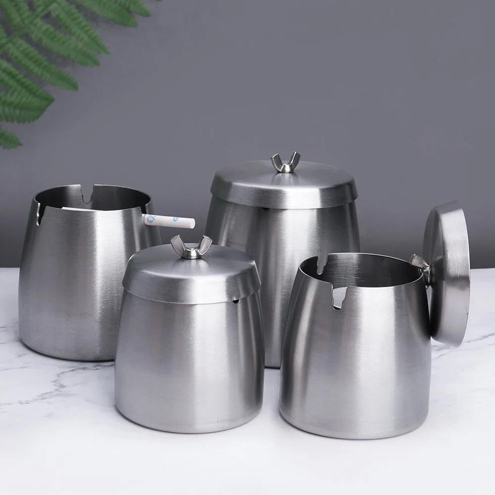 Thickened Stainless Steel Household Living Room Car Windproof Metal Ashtray With Cover Support 
Thickened Stainless Steel Household Living Room Car Windproof Metal Ashtray With Cover Support
