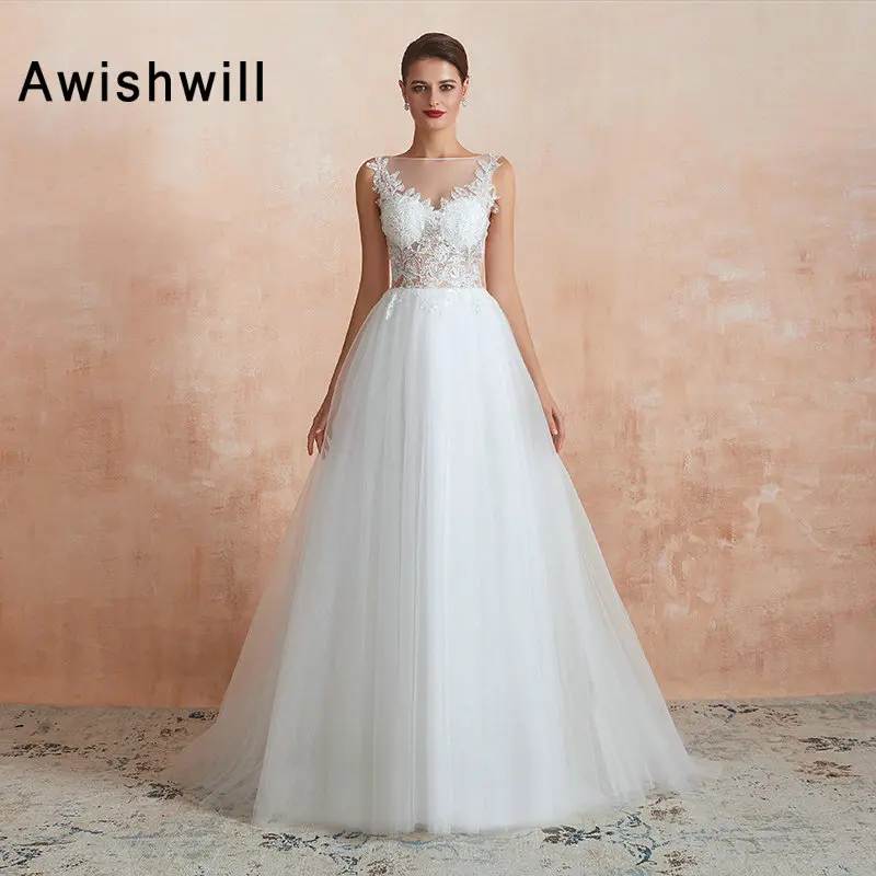 White Ivory Wedding Dresses Vestido de Noiva 2020 Appliques Sequined A Line Sleeveless Tulle Transparent Bride Wedding Gown
White Ivory Wedding Dresses Vestido de Noiva 2020 Appliques Sequined A Line Sleeveless Tulle Transparent Bride Wedding Gown