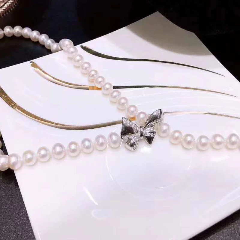 925 half silver butterfly clip DIY jewelry material pearl necklace fixing clip accessories
925 half silver butterfly clip DIY jewelry material pearl necklace fixing clip accessories