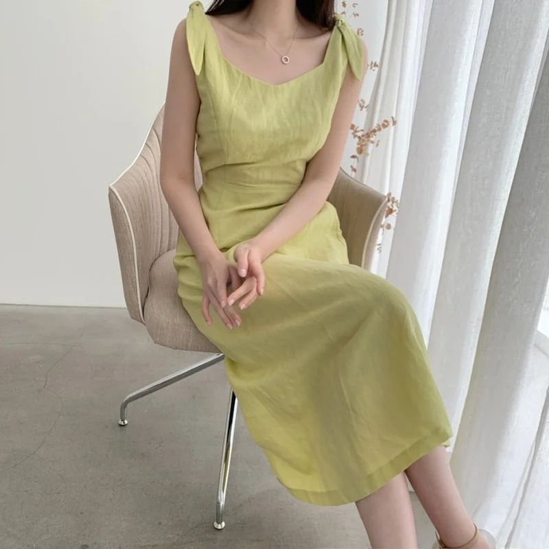 Kimotimo Woman Dress Korean Chic Solid Sling Dress 2021 Summer French O-neck Bow Design Sleeveless Temperament Waist Long Dress 
Kimotimo Woman Dress Korean Chic Solid Sling Dress 2021 Summer French O-neck Bow Design Sleeveless Temperament Waist Long Dress