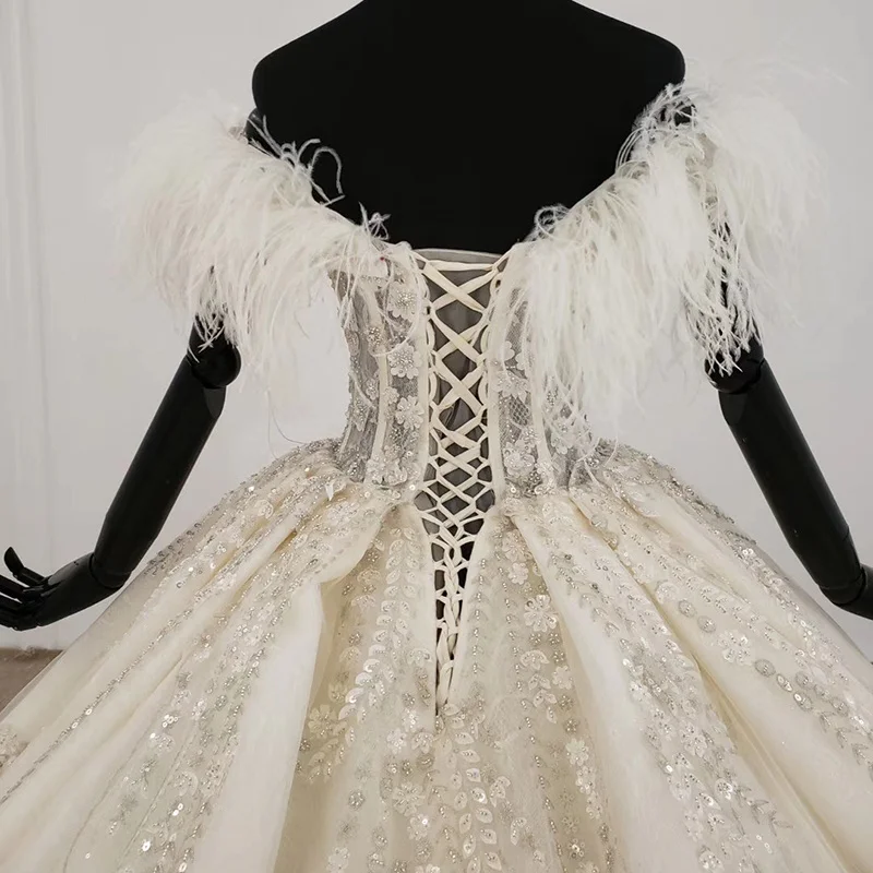 Wedding dresses BLG1248 luxury beaded lace sexy sequin feather off shoulder wedding dress ball gown
Wedding dresses BLG1248 luxury beaded lace sexy sequin feather off shoulder wedding dress ball gown