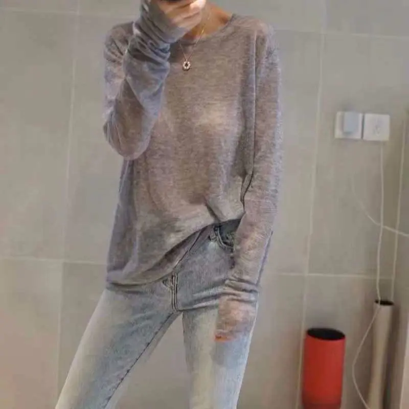 Autumn and winter new ultra thin and micro transparent sweater round neck large base sweater women's loose Korean Short Knitwear
Autumn and winter new ultra thin and micro transparent sweater round neck large base sweater women's loose Korean Short Knitwear
