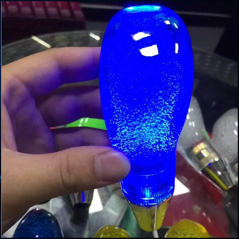 1Pcs Universal Auto Luminous Crystal LED Light Gear Shift Head Manual Automatic Gear Head Colorful PVC Gear Head Car Accessories 
1Pcs Universal Auto Luminous Crystal LED Light Gear Shift Head Manual Automatic Gear Head Colorful PVC Gear Head Car Accessories