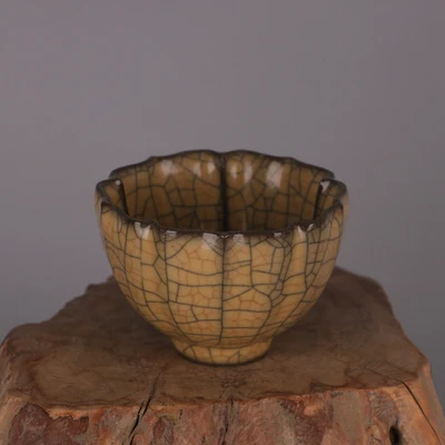 

Imitation song Ge kiln yellow glaze gold wire iron wire melon ridge Kui mouth cup iron tire porcelain ornament