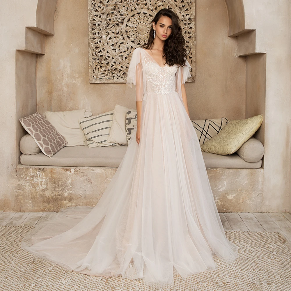 Simlple boho Bridal Gown 2021 new Sexy V-neck beach Bride Wedding Dress Luxury lace Crystal Vestido de novia Robe de mariee
Simlple boho Bridal Gown 2021 new Sexy V-neck beach Bride Wedding Dress Luxury lace Crystal Vestido de novia Robe de mariee