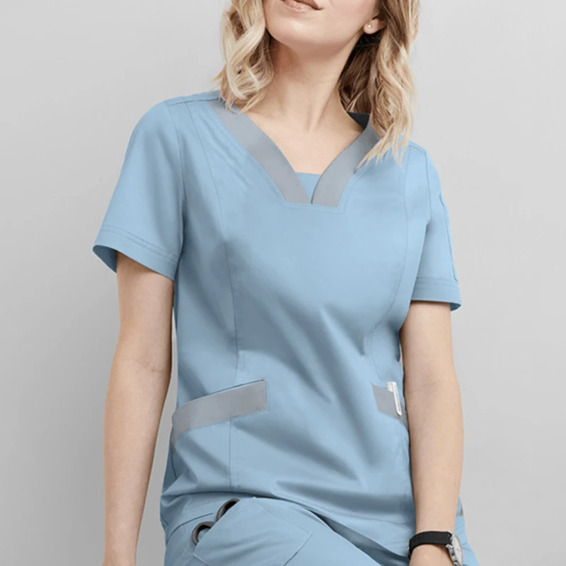 Women Short Sleeve Beauty Uniform V-neck Scrubs Tops Spa Uniform Health Workers Working Scrub Tops Nurse gorro enfermera 2021
Women Short Sleeve Beauty Uniform V-neck Scrubs Tops Spa Uniform Health Workers Working Scrub Tops Nurse gorro enfermera 2021