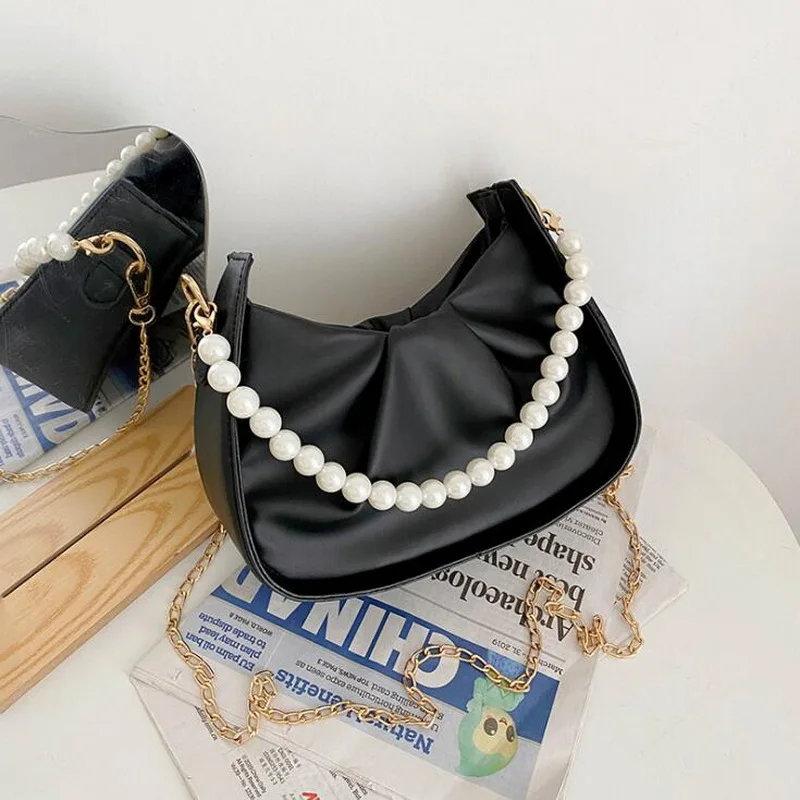 2021 new cloud bag fashion pearl bag women summer simple chain cross-body bag INS armpit bag 
2021 new cloud bag fashion pearl bag women summer simple chain cross-body bag INS armpit bag