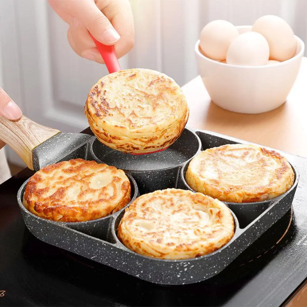 Multifunctional Nonstick Frying Pan Four Hole Frying Pan With Heat-resistant Handles For Egg Frying Hamburger Making
Multifunctional Nonstick Frying Pan Four Hole Frying Pan With Heat-resistant Handles For Egg Frying Hamburger Making