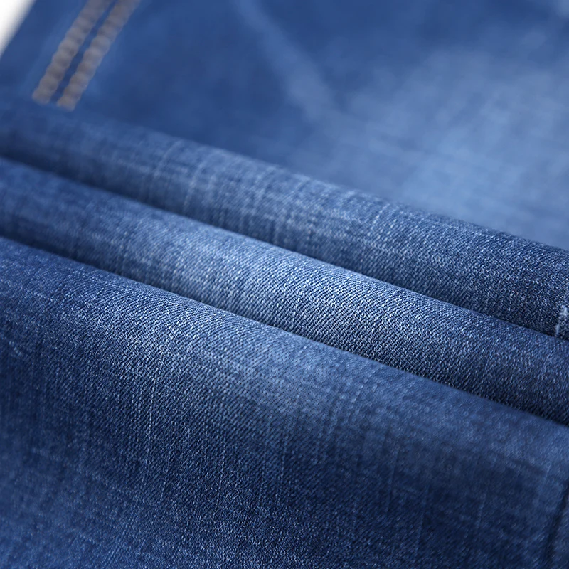 2021 spring and summer high-quality cotton stretch lightweight slim jeans classic buttons youth fashion casual thin denim jeans 
2021 spring and summer high-quality cotton stretch lightweight slim jeans classic buttons youth fashion casual thin denim jeans