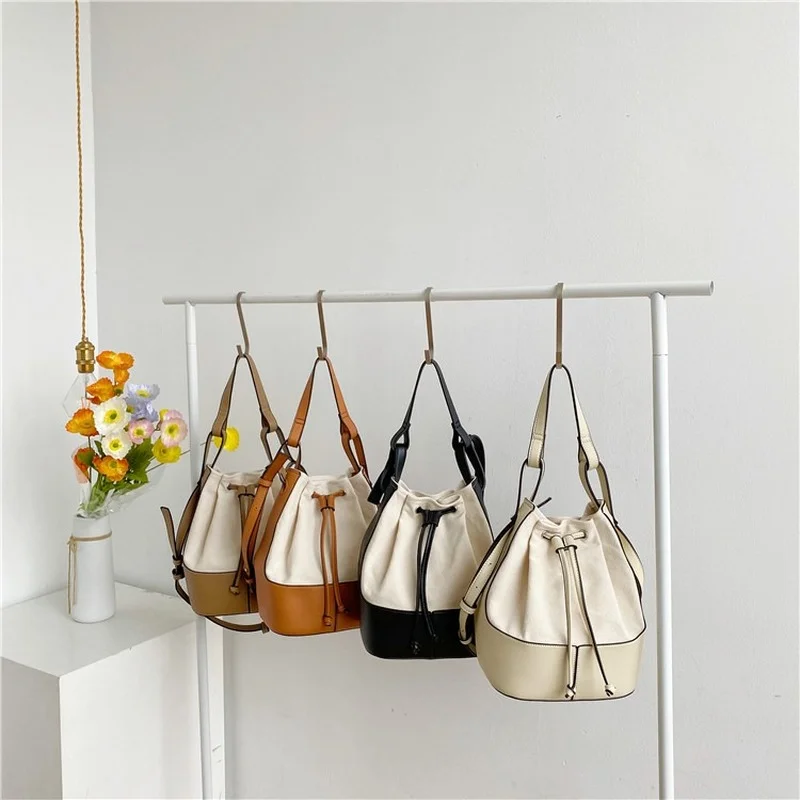 Women's Bag Shoulder 2021 Large-capacity Bucket Totes Simple Fashion Canvas PU Matching Crossbody Bags Korean Style Handbags
Women's Bag Shoulder 2021 Large-capacity Bucket Totes Simple Fashion Canvas PU Matching Crossbody Bags Korean Style Handbags