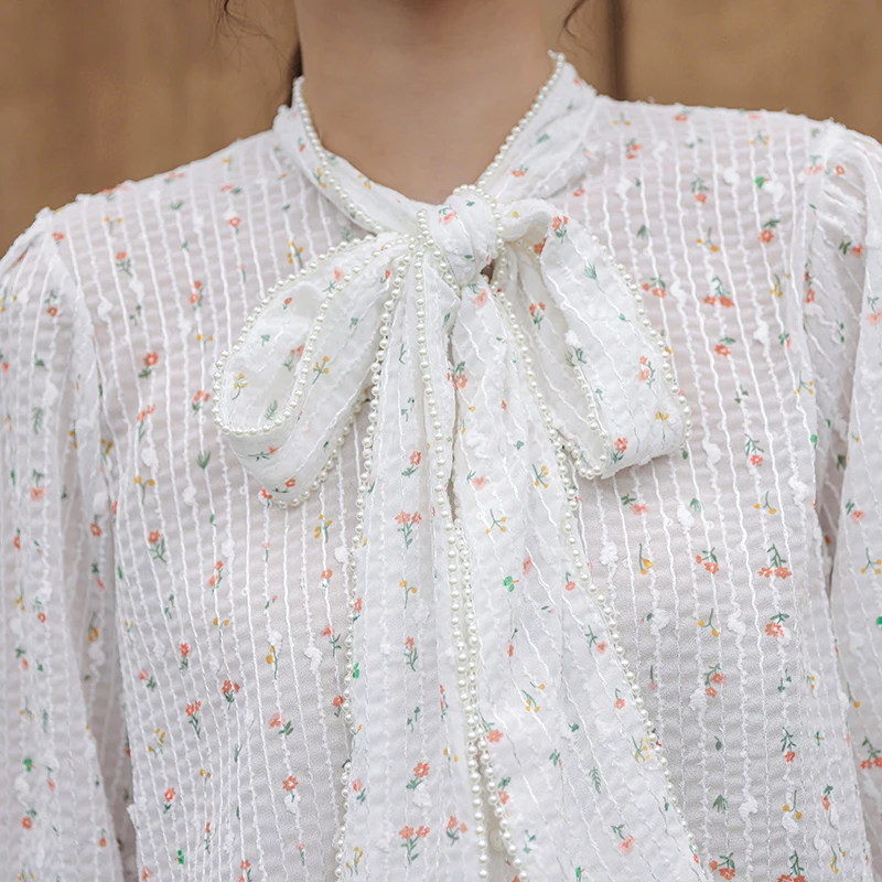 Beaded Pearl Elegant Blouse Women Autumn Spring Bowtie White Shirts Female Plus Size Flower Printed Blusa Mujer Korean
Beaded Pearl Elegant Blouse Women Autumn Spring Bowtie White Shirts Female Plus Size Flower Printed Blusa Mujer Korean