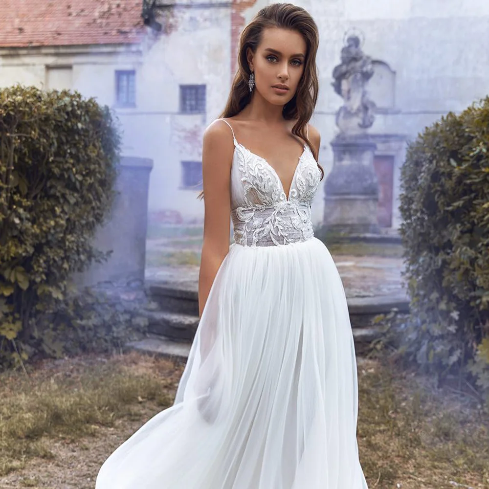 Sexy V neck Illusion Wedding Dress Vestido De Noiva Spaghetti Straps Pleats Lace Applique Tulle Backless Bridal Dresses
Sexy V neck Illusion Wedding Dress Vestido De Noiva Spaghetti Straps Pleats Lace Applique Tulle Backless Bridal Dresses