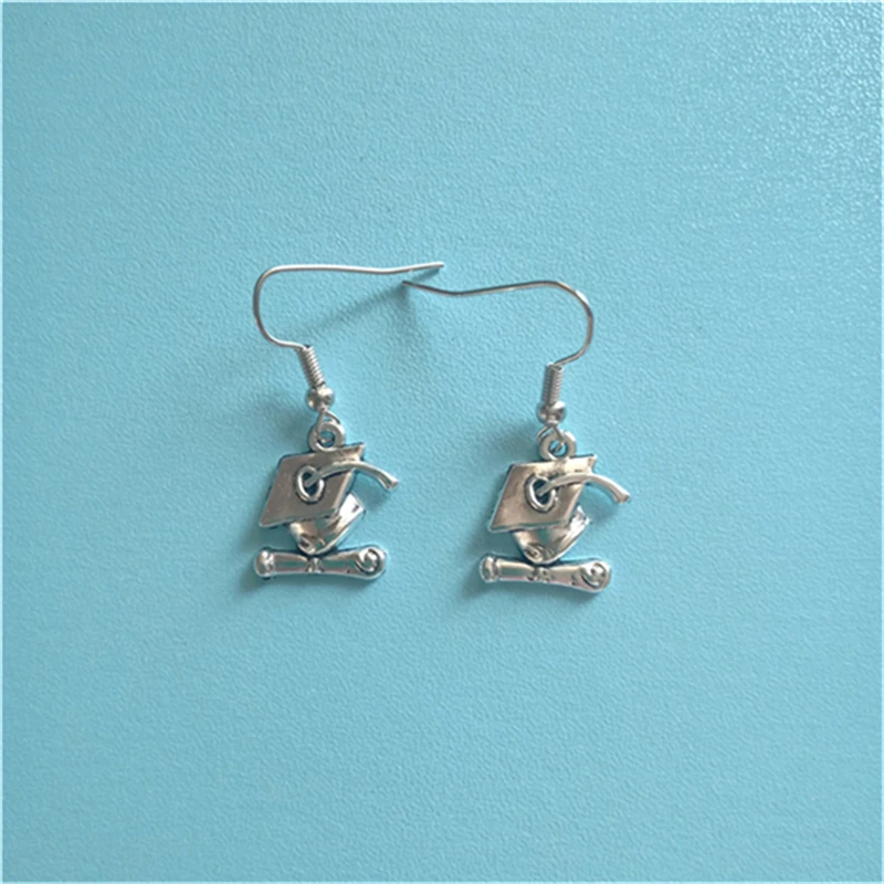 Graduation Cap Earrings, Gothic Jewellery, Graduation Jewelry, Dangling Earrings, Punk Jewelry, Graduate Gift 
Graduation Cap Earrings, Gothic Jewellery, Graduation Jewelry, Dangling Earrings, Punk Jewelry, Graduate Gift