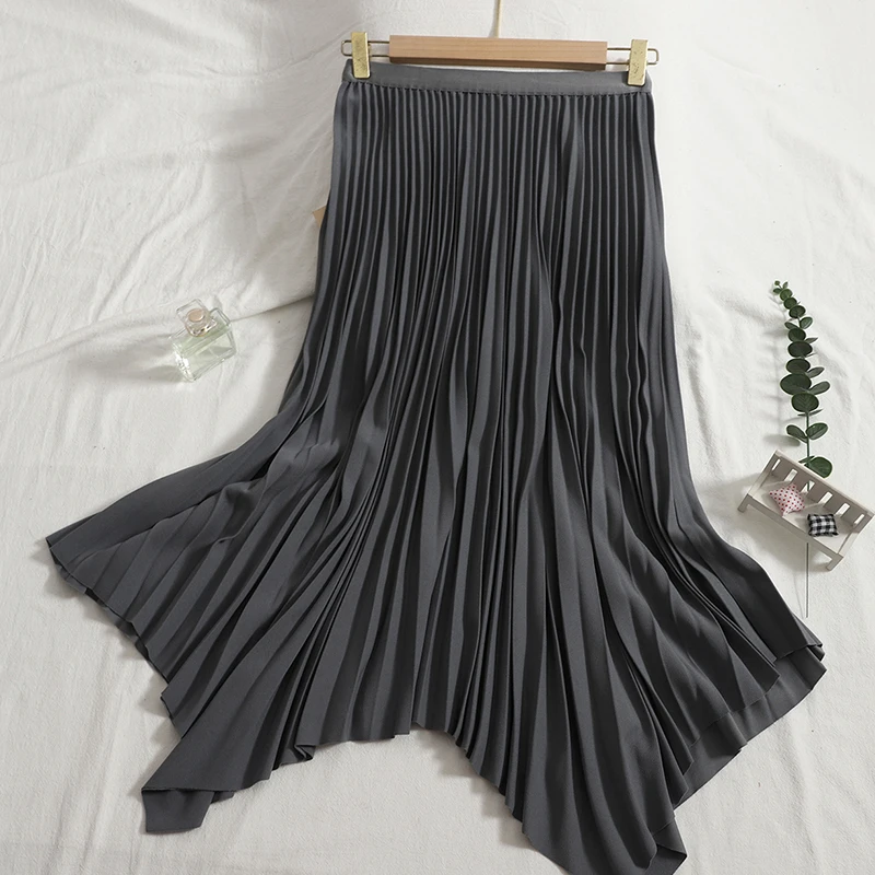 Korean thin irregular long skirt women temperament pure color pleated skirts 2021 autumn black A-line office skirt female trend
Korean thin irregular long skirt women temperament pure color pleated skirts 2021 autumn black A-line office skirt female trend