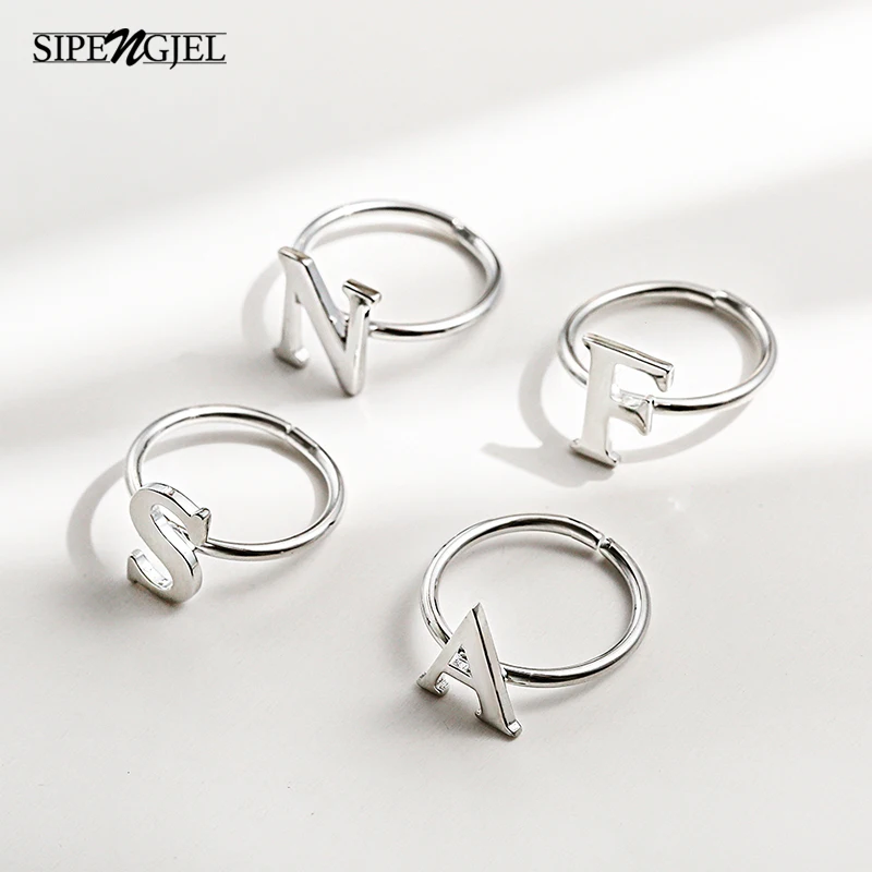 SIPENGJEL Fashion Silver Color Metal Initials Letter Rings Adjustable Opening Name Ring For Women Jewelry 2021
SIPENGJEL Fashion Silver Color Metal Initials Letter Rings Adjustable Opening Name Ring For Women Jewelry 2021