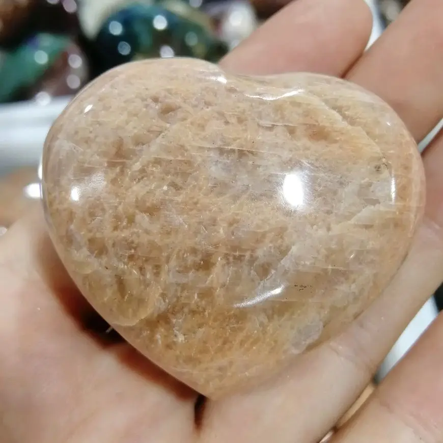 Natural orange moonstone heart palm stone mineral specimen crystal stone Love ornament Healing Gifts
Natural orange moonstone heart palm stone mineral specimen crystal stone Love ornament Healing Gifts