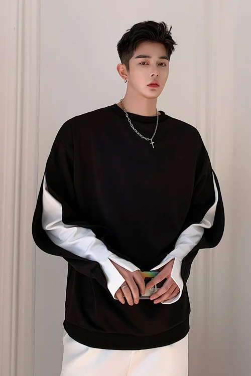 M-XL!2020 spring ins Hong Kong style net red design fake two color matching pullover sweater male loose student tide jacket. 
M-XL!2020 spring ins Hong Kong style net red design fake two color matching pullover sweater male loose student tide jacket.