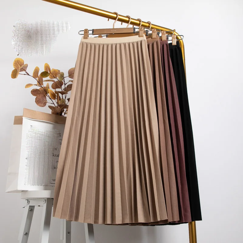 Pure color simple organ pleated skirt skirt spring and autumn women's mid-length high waist belt all-match A-line long skirt 
Pure color simple organ pleated skirt skirt spring and autumn women's mid-length high waist belt all-match A-line long skirt