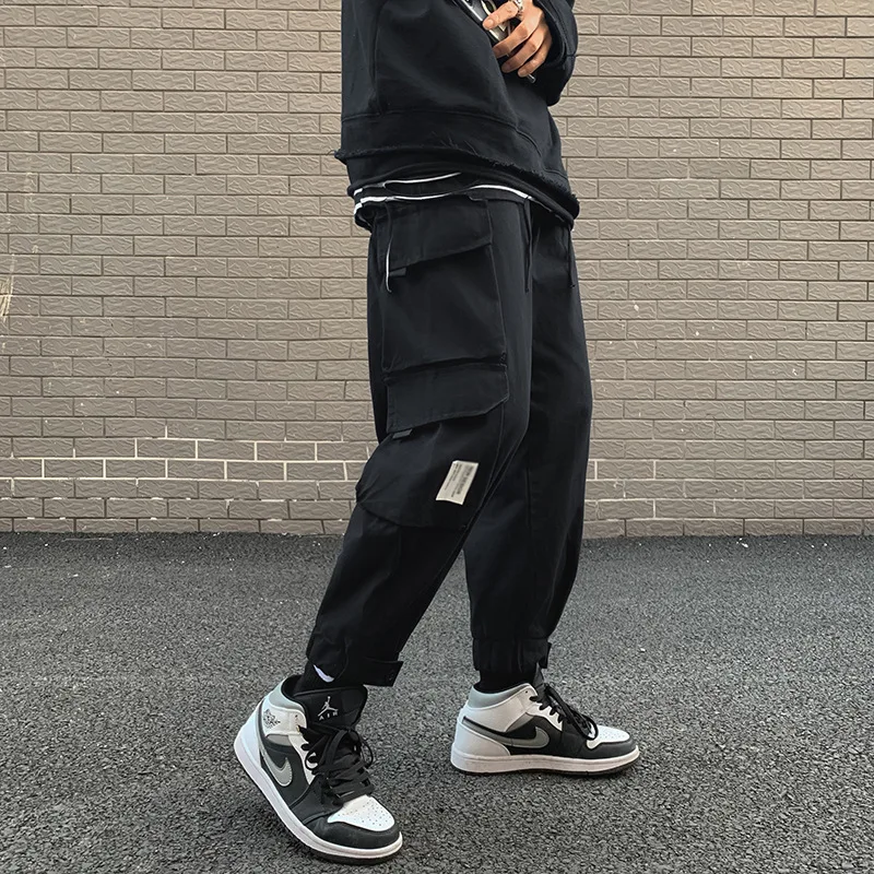 Tasche laterali da uomo Cargo Harem Pants 2021 pantaloni Hip-Hop Casual da uomo neri pantaloni moda Casual Streetwear
Tasche laterali da uomo Cargo Harem Pants 2021 pantaloni Hip-Hop Casual da uomo neri pantaloni moda Casual Streetwear