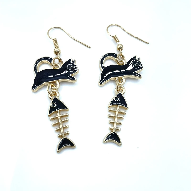 Brand new Korean version of dripping alloy double hanging cat fish bone cute pendant earrings jewelry pendant, lady cat earrings
Brand new Korean version of dripping alloy double hanging cat fish bone cute pendant earrings jewelry pendant, lady cat earrings