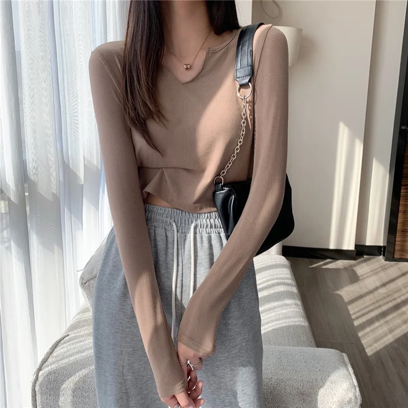 Новинка осенний облегающий V-образный вырез 
Новинка осенний облегающий V-образный вырез