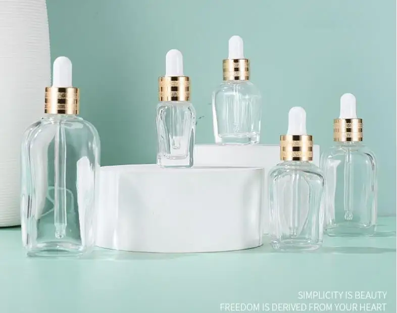 100pcs Transparent 20ml Essential Oil Square Dropper Bottle 10ml 30ml 50ml Glass Serum Bottle with Gold Cap for Cosmetic SN1250 
100pcs Transparent 20ml Essential Oil Square Dropper Bottle 10ml 30ml 50ml Glass Serum Bottle with Gold Cap for Cosmetic SN1250