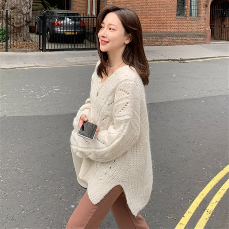 2020 new fashion autumn and winter retro style knit sweater V-neck casual knitted sweater women
2020 new fashion autumn and winter retro style knit sweater V-neck casual knitted sweater women